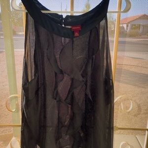Black blouse w/ruffles in front.